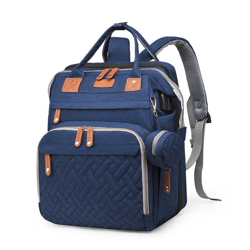 Baby travel backpack with storage and fold-out attachment