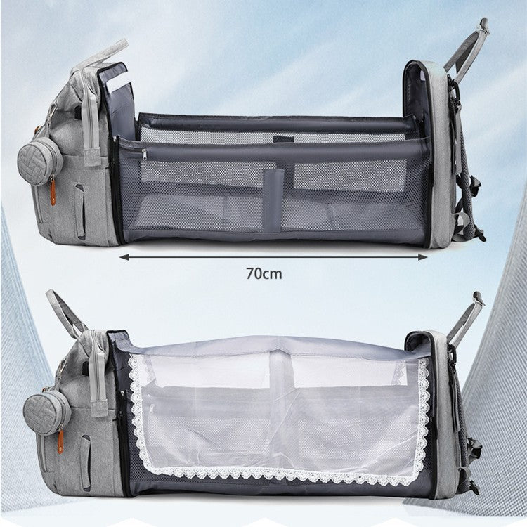 Baby travel backpack with storage and fold-out attachment