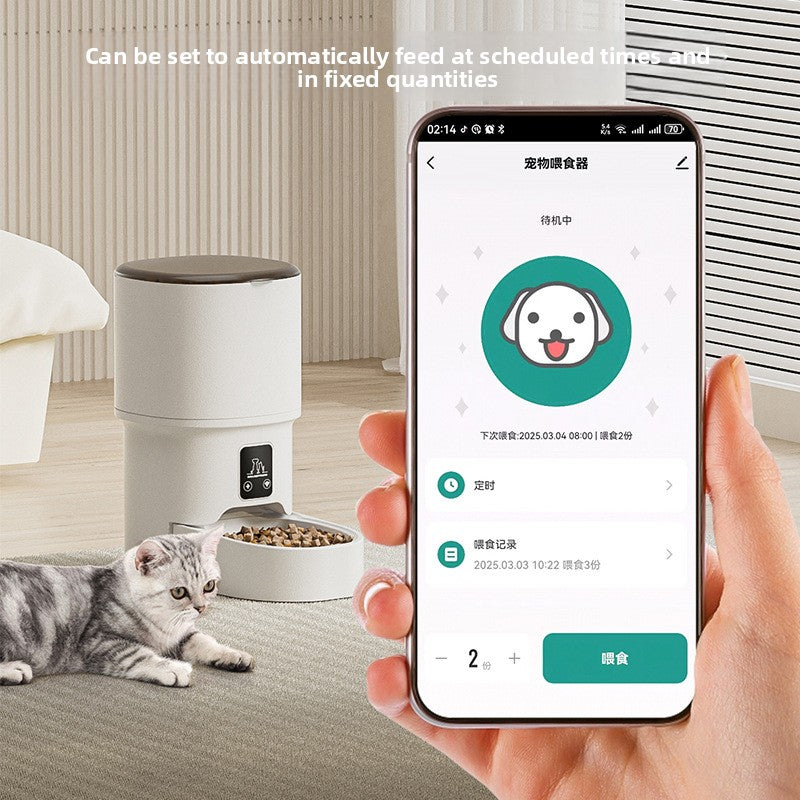 Automatic pet feeder and smartphone showing a feeding schedule