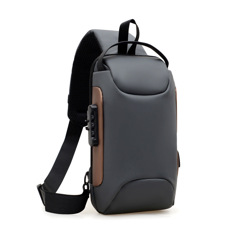 Gray Gold chest bag with brown side trim and shoulder strap
