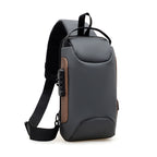 Gray Gold chest bag with brown side trim and shoulder strap
